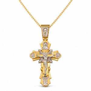 delicate gold chain and crucifix