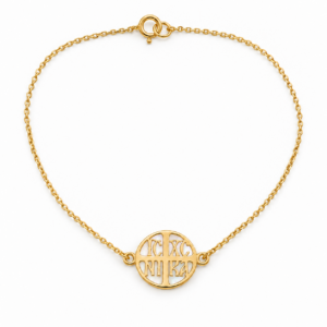 gold bracelet with nacre cross medallion
