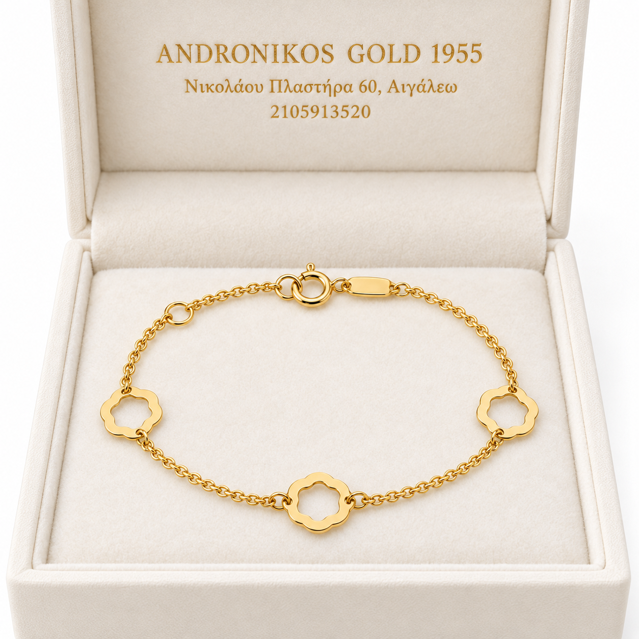 gold bracelet with three open floral stations gold bracelet with three open floral stations