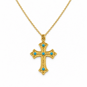 ornate gold cross with turquoise cabochons