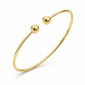 yellow gold open cuff with twin spheres